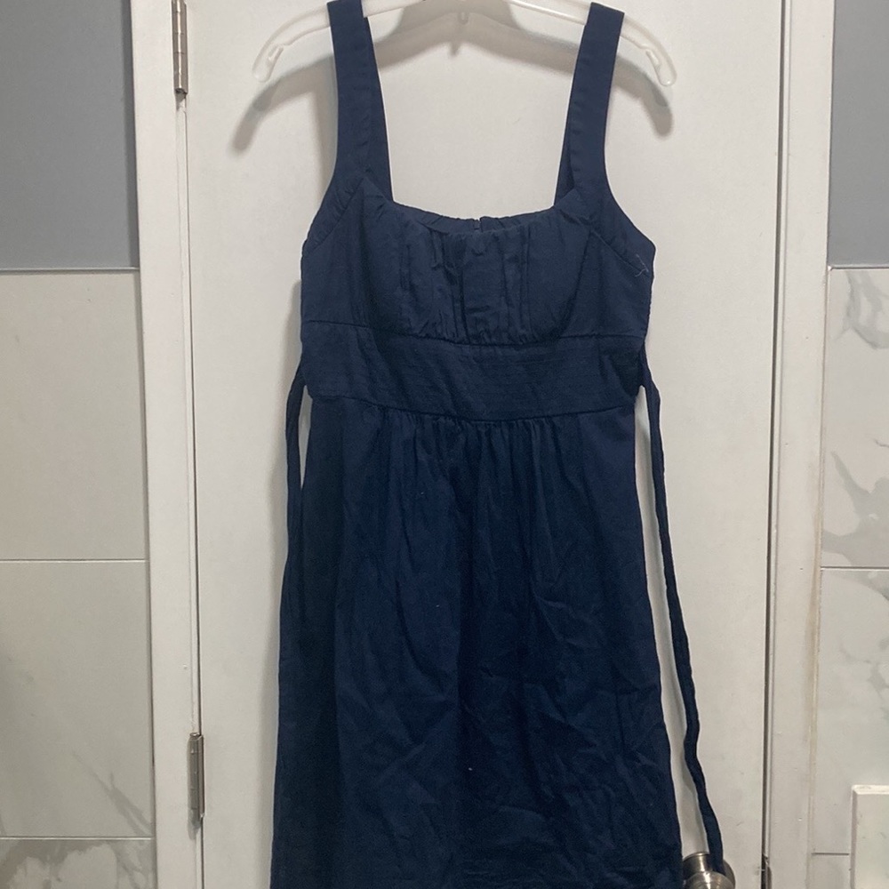 Dark blue dress with a tie in the back